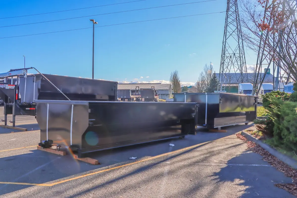 Roll-off dumpster ready for waste disposal at job site for 20 Yard Dumpster Rental in Weston